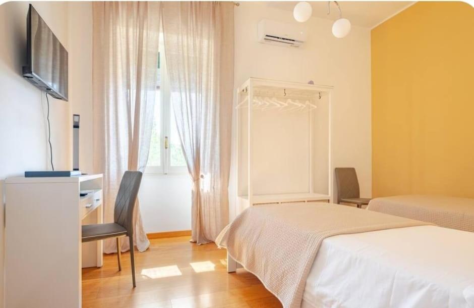 Postel nebo postele na pokoji v ubytování Calogiuri Nest