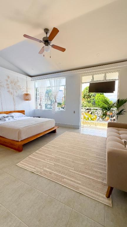 Ένα ή περισσότερα κρεβάτια σε δωμάτιο στο Amelia Casa Hotel