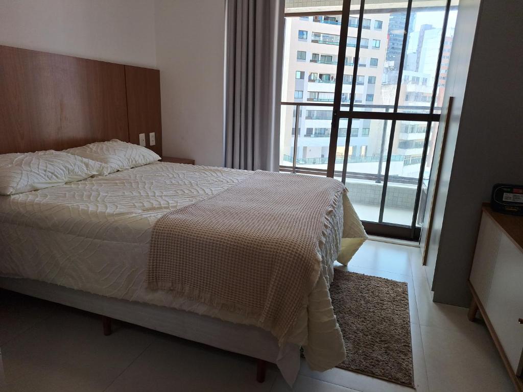 Postel nebo postele na pokoji v ubytování Studio Zn Barra