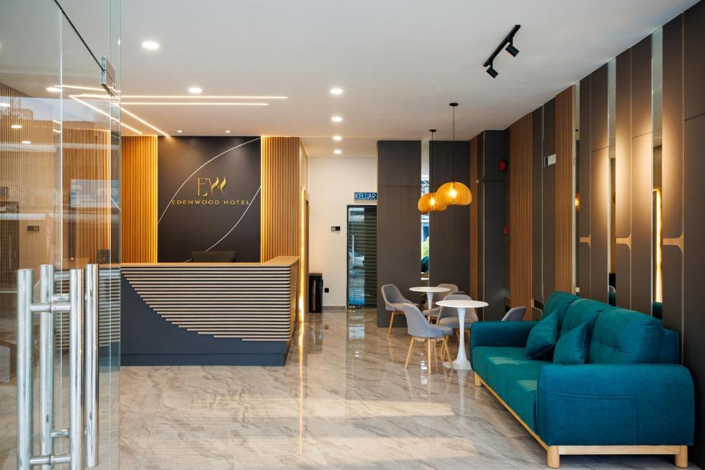 Χώρος καθιστικού στο Edenwood Hotel