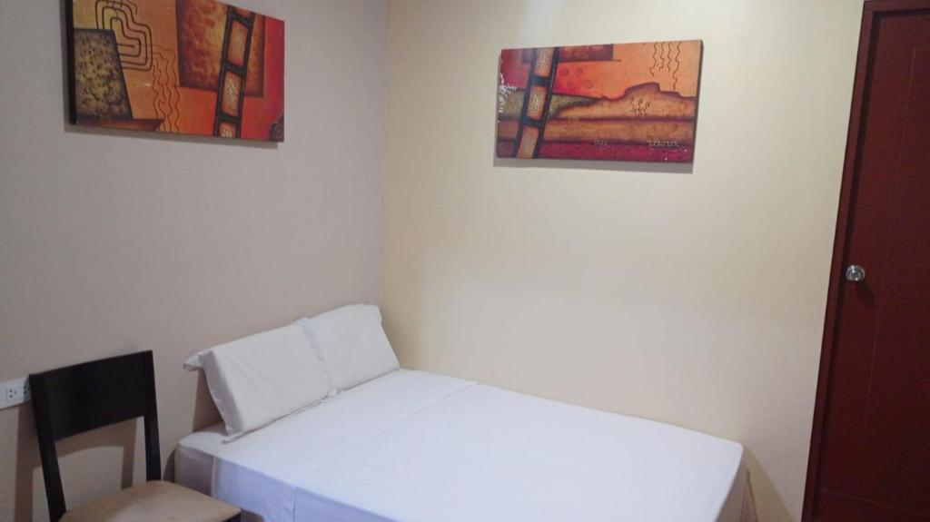 Postel nebo postele na pokoji v ubytování Hospedaje el señorial