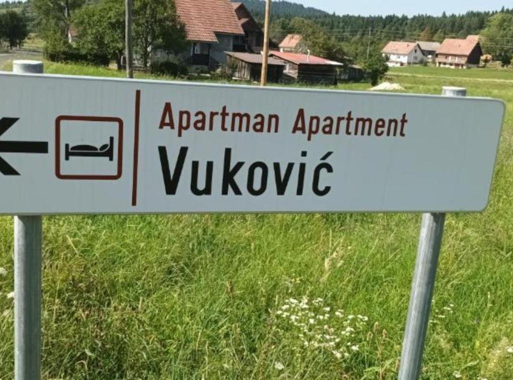 a sign that reads apartmentarian apartment vukhovknife at Holiday Apartment Vuković in Saborsko