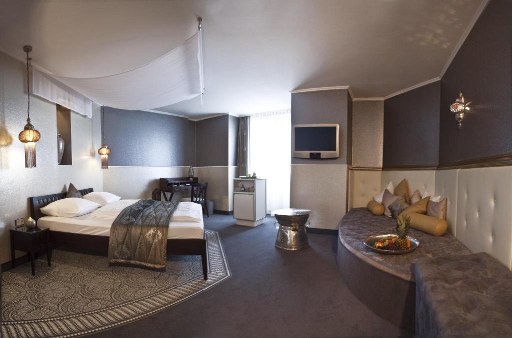 Postel nebo postele na pokoji v ubytování Ringhotel Reubel