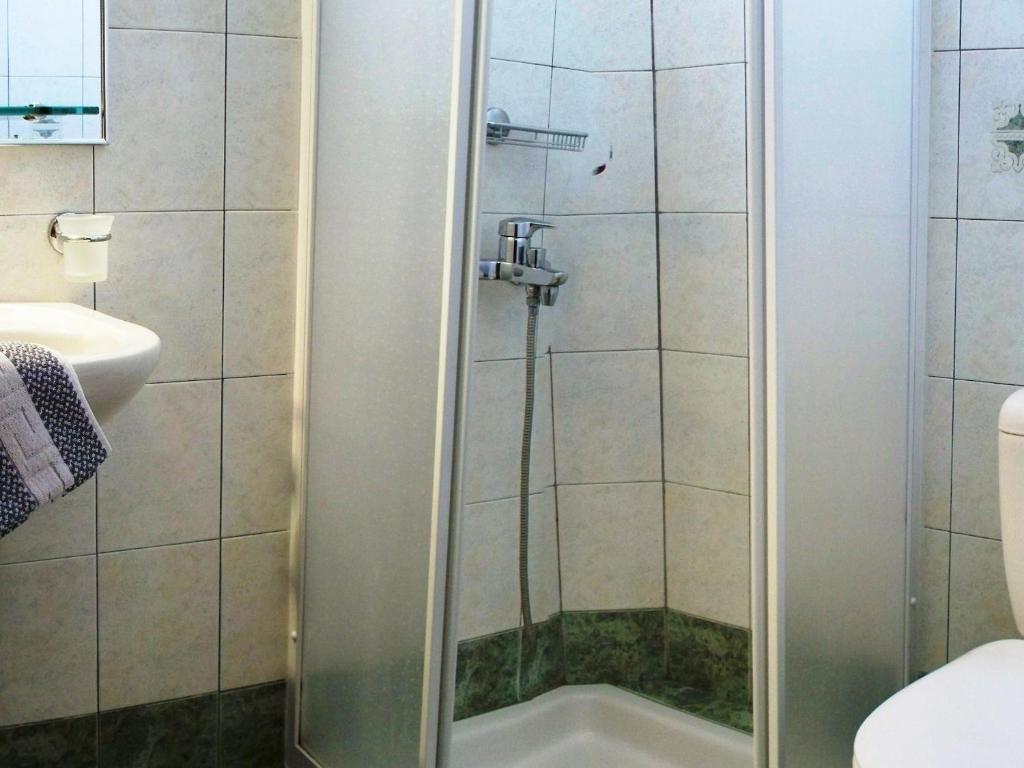 Koupelna v ubytování Plaka Hotel I
