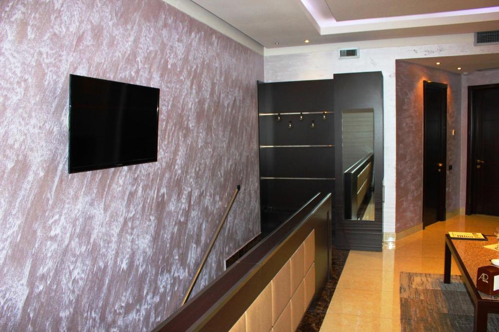 TV a/nebo společenská místnost v ubytování Avan Plaza Hotel