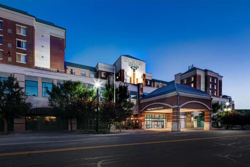 an empty street in a city at night at Homewood Suites by Hilton Salt Lake City Downtown in Salt Lake City