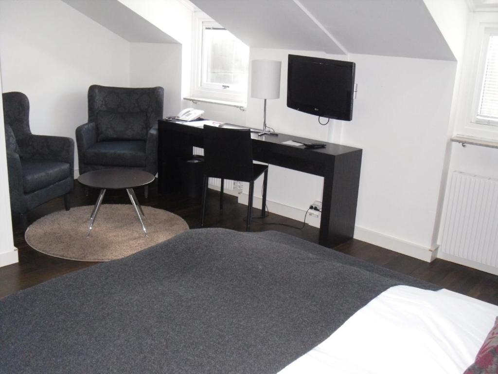 Kuchyň nebo kuchyňský kout v ubytování First Hotel Witt