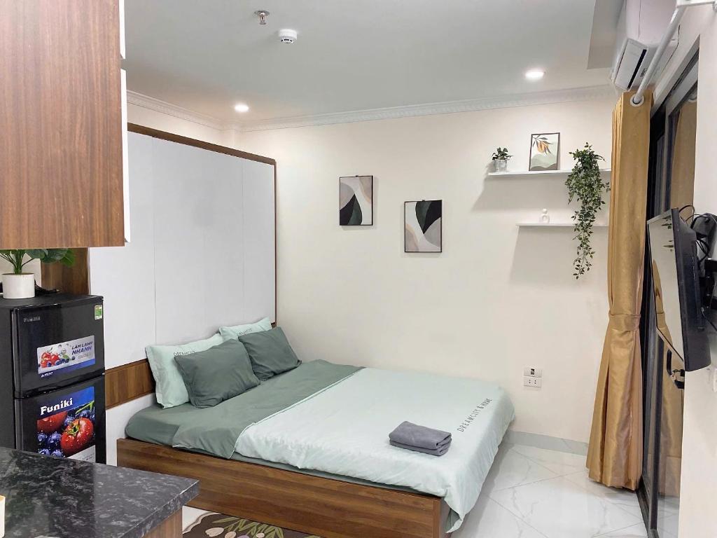 Μια τηλεόραση ή/και κέντρο ψυχαγωγίας στο Hera West Lake Apartment