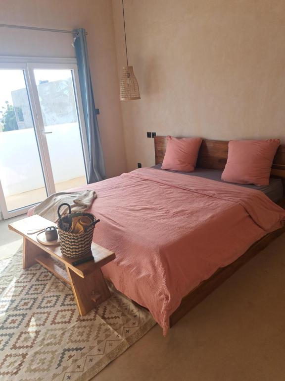 Postel nebo postele na pokoji v ubytování Villa Face a l'océan