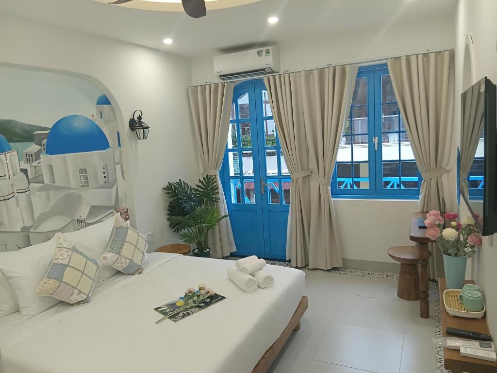 Ένα ή περισσότερα κρεβάτια σε δωμάτιο στο LG Villa My Khe Beach