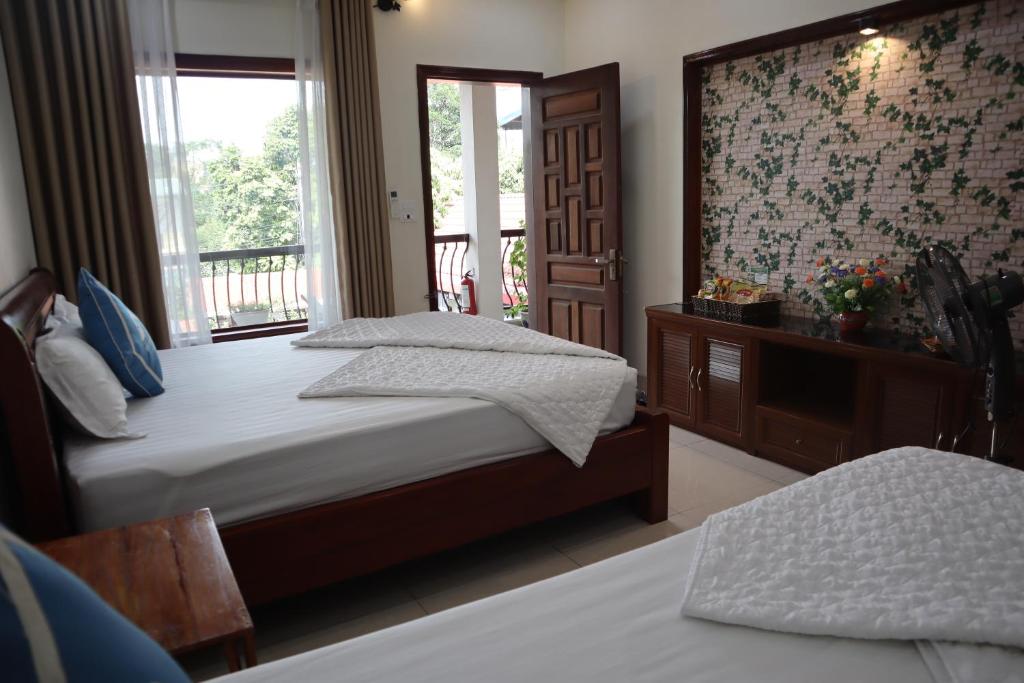 Mai Mountain Homestay - Dreibettzimmer