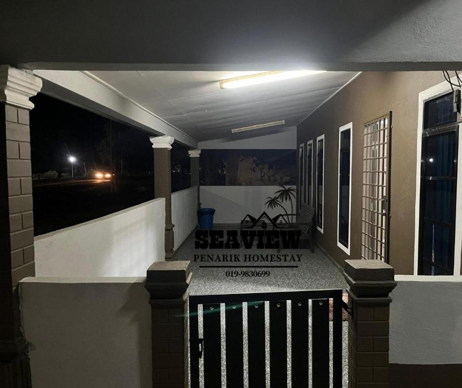 a front porch of a house at night at SeaView Homestay in Kampong Ru Sepuloh