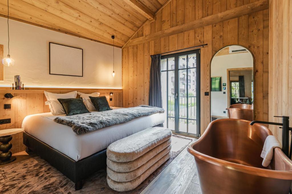 Postel nebo postele na pokoji v ubytování L'Écrin de Megève