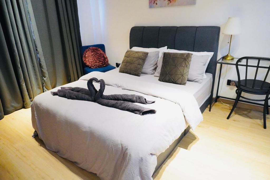 Postel nebo postele na pokoji v ubytování Cozy Studio Home2Stay