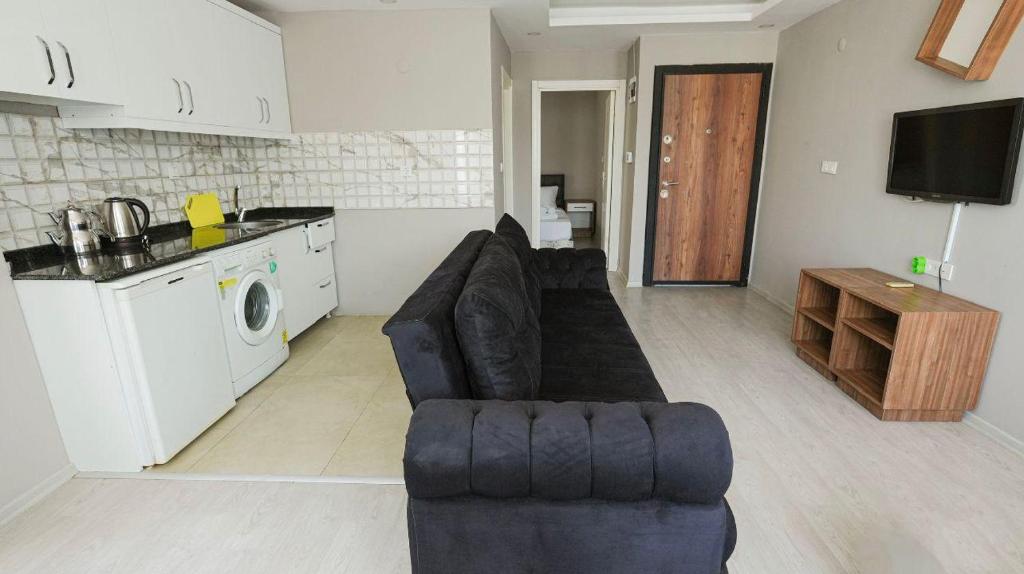 Η κουζίνα ή μικρή κουζίνα στο NearMe Apart