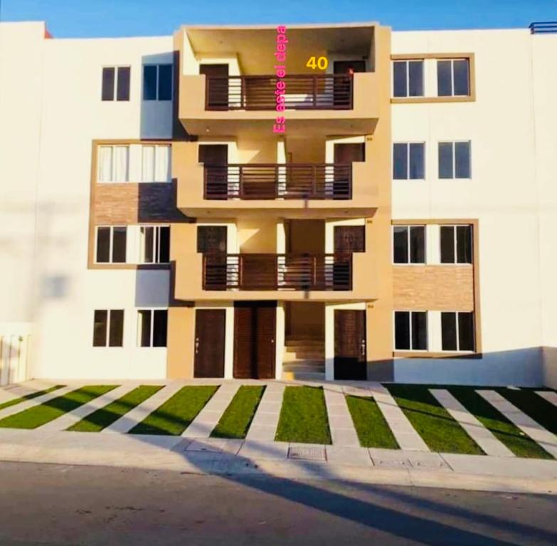 an image of a building with the number on it at Estrella de maryam in Tijuana