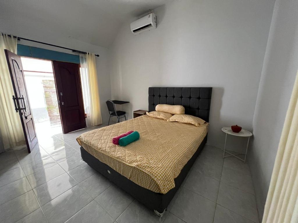 Katil atau katil-katil dalam bilik di Park side nest studio room 2