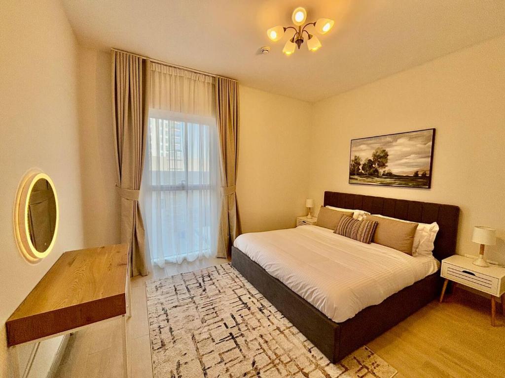 Ένα ή περισσότερα κρεβάτια σε δωμάτιο στο Perfect Yas Island Escape