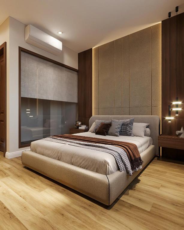 a bedroom with a large bed and a large window at Splendid Star Boutique Hotel in Hanoi