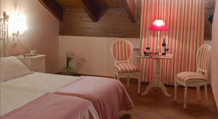 Cama o camas de una habitación en Casa Rural Rojanda