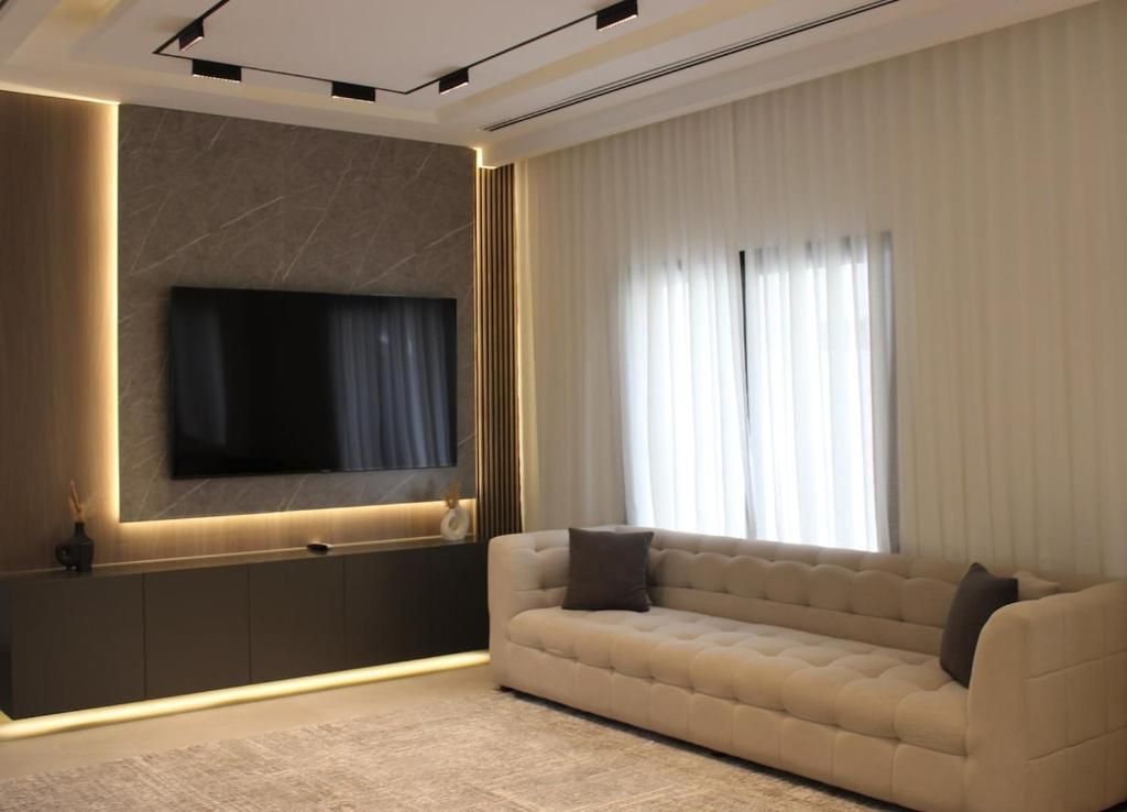 Χώρος καθιστικού στο Lavita Villa - Stunning pool villa Ajman