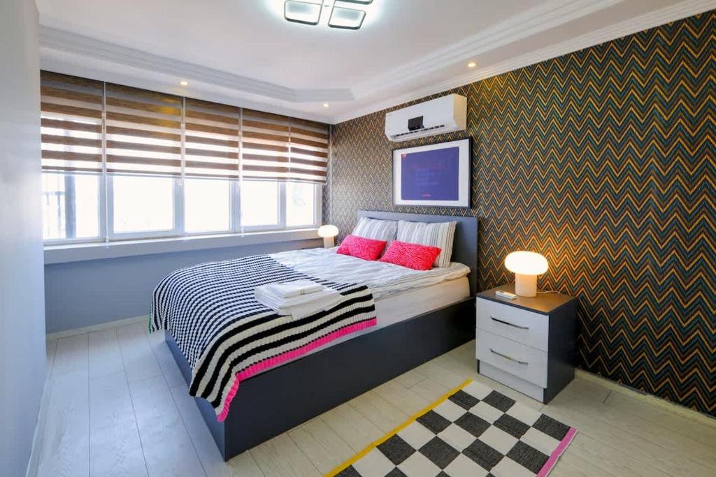 Katil atau katil-katil dalam bilik di Central Flat in Kaleici with Sea View Near Beach
