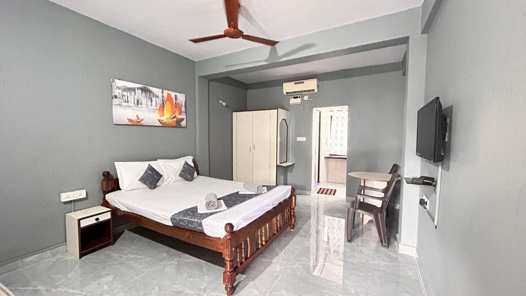 Postel nebo postele na pokoji v ubytování Jackson's Beach House Calangute