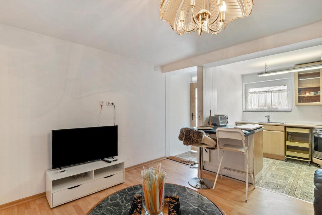 Μια τηλεόραση ή/και κέντρο ψυχαγωγίας στο Ferienwohnung Doris