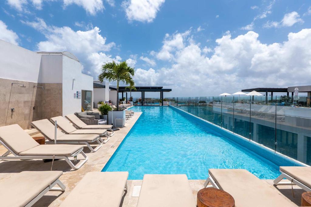 Picture of Stylish Condo w Roof Pool & Jacuzzi in Prime Playa, Playa del Carmen ...