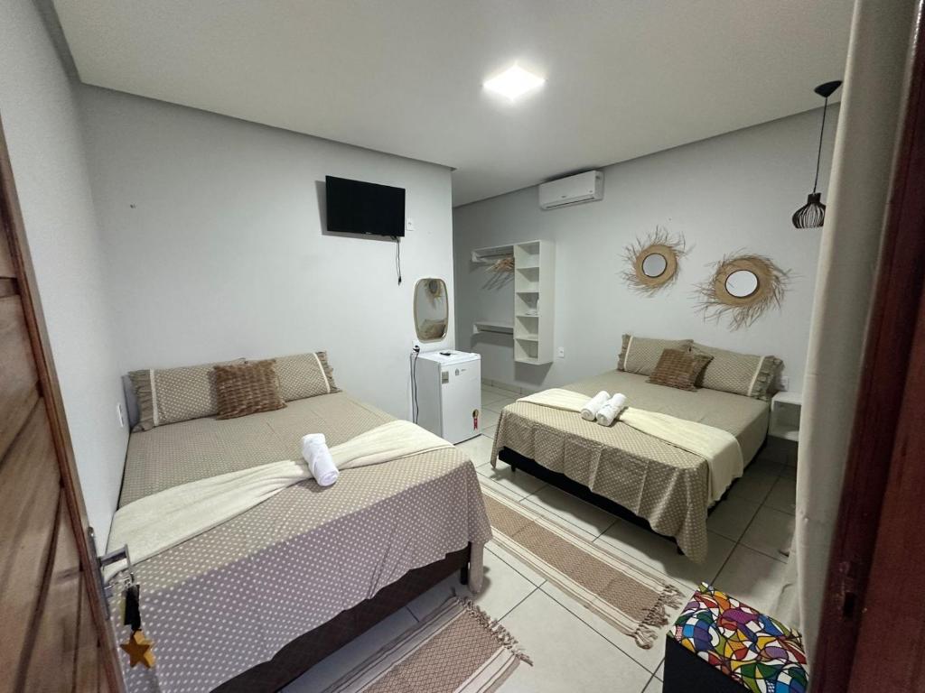 Postel nebo postele na pokoji v ubytování Casa de Temporada Estrela de Alter