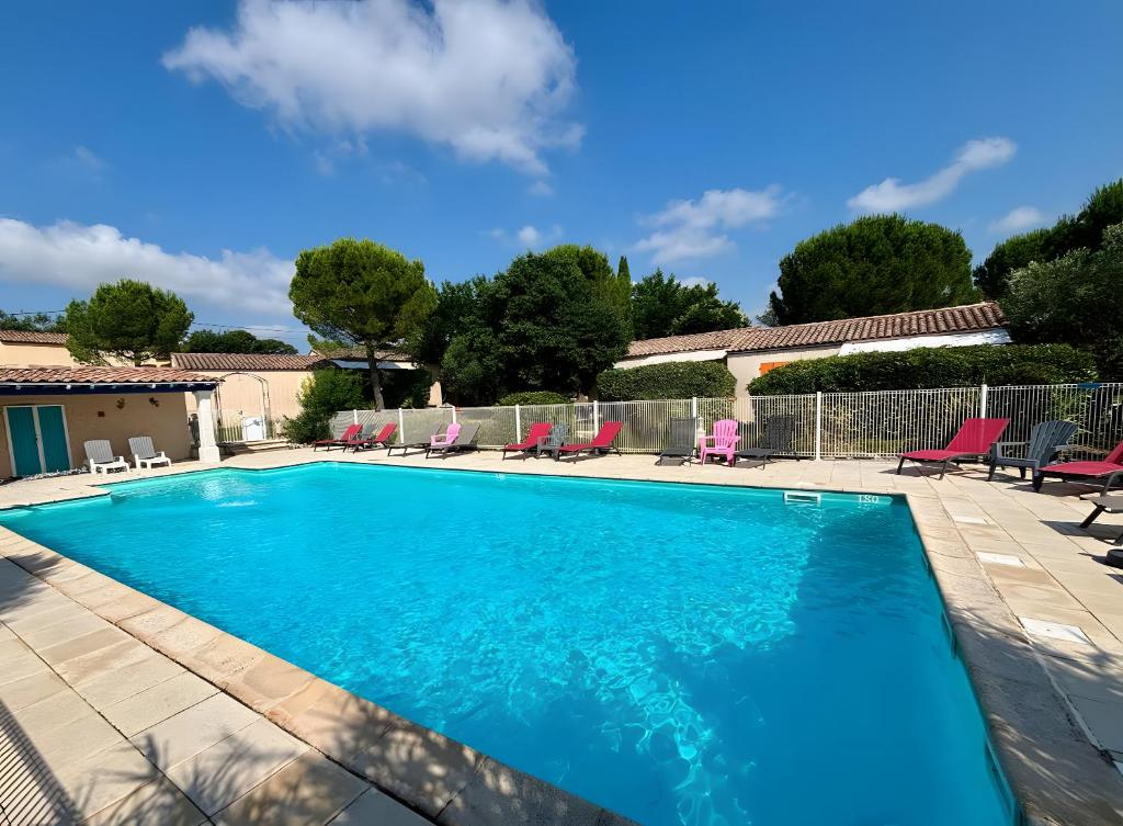 Swimmingpoolen hos eller tæt på Gite les Mazets du Rouret