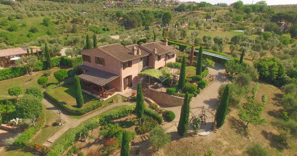 an overhead view of a house with a bunch of trees at Villa i Colli in Montaione