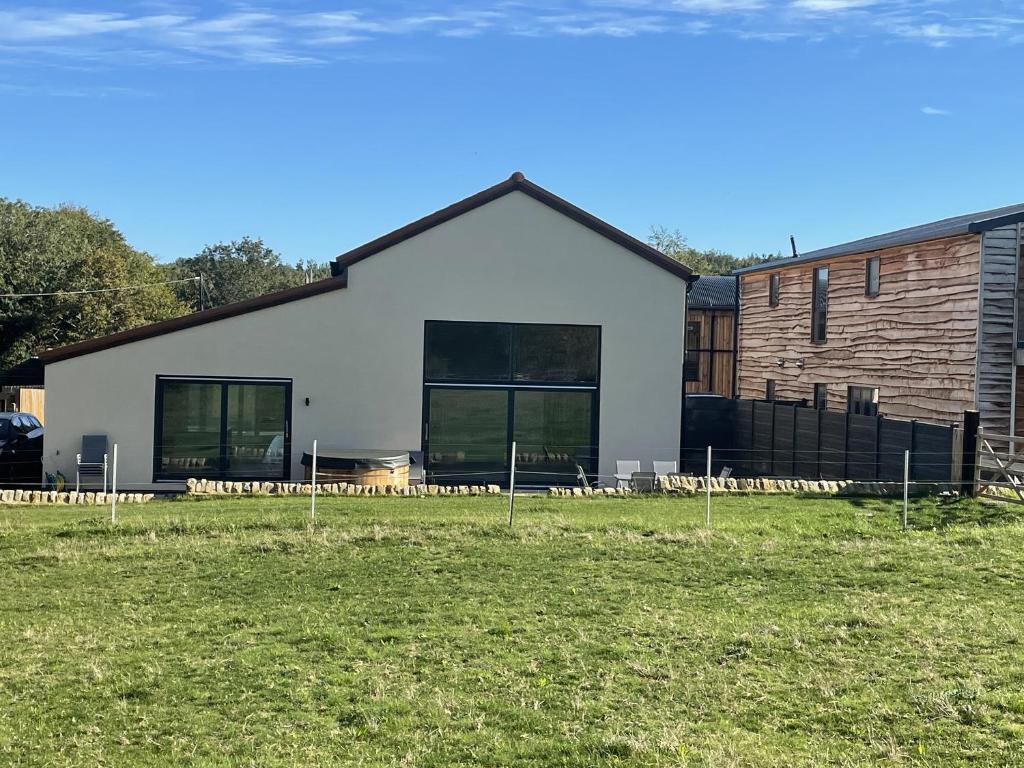 a house with a large yard in front of it at 1 New Dairy Barn in Sunderland Bridge