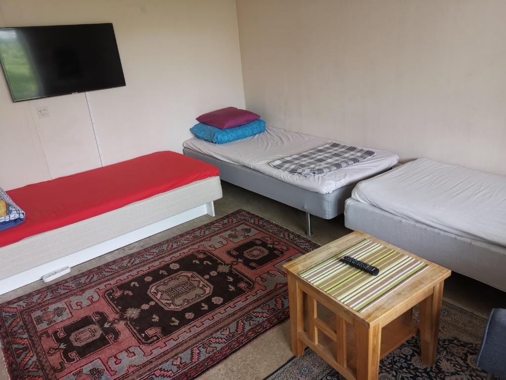 Postel nebo postele na pokoji v ubytování Alex Laghai