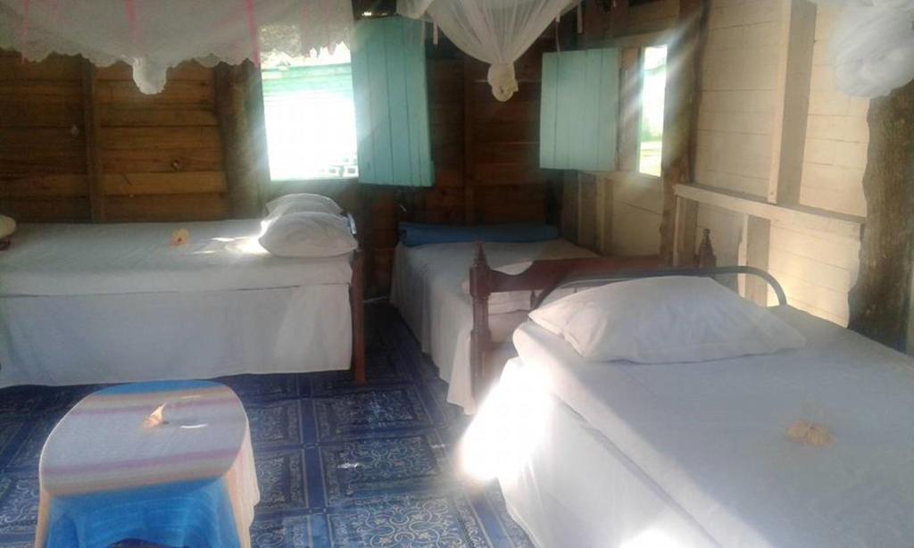 Letto o letti in una camera di Yasawa Homestays