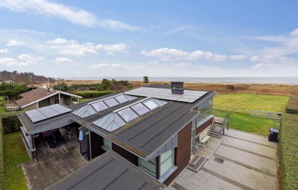 an overhead view of a house with a glass roof at 4 Bedroom Lovely Home In Hadsund in Øster Hurup