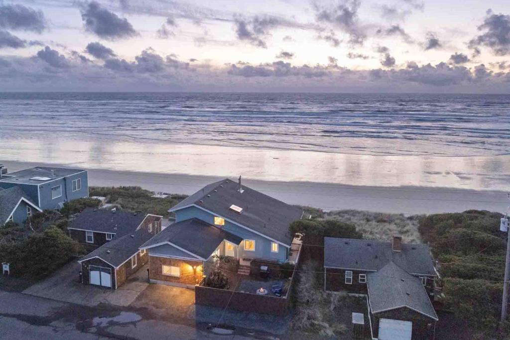 an aerial view of a house on the beach at Beachfront Family Sanctuary in Rockaway Beach