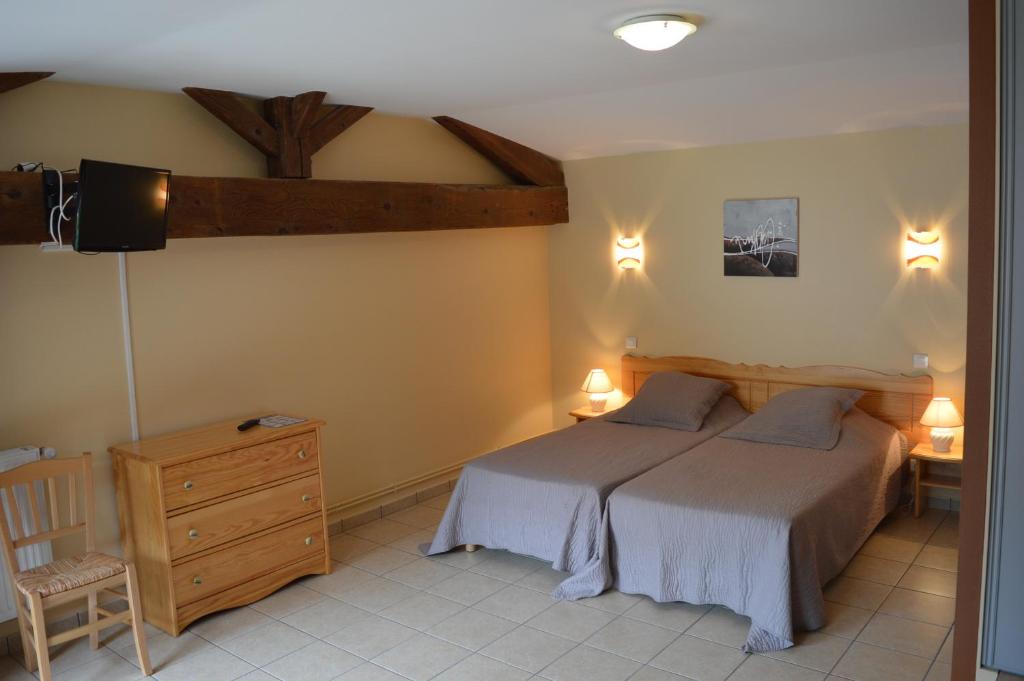 Postel nebo postele na pokoji v ubytování Côté Midi Chambre d'hôte