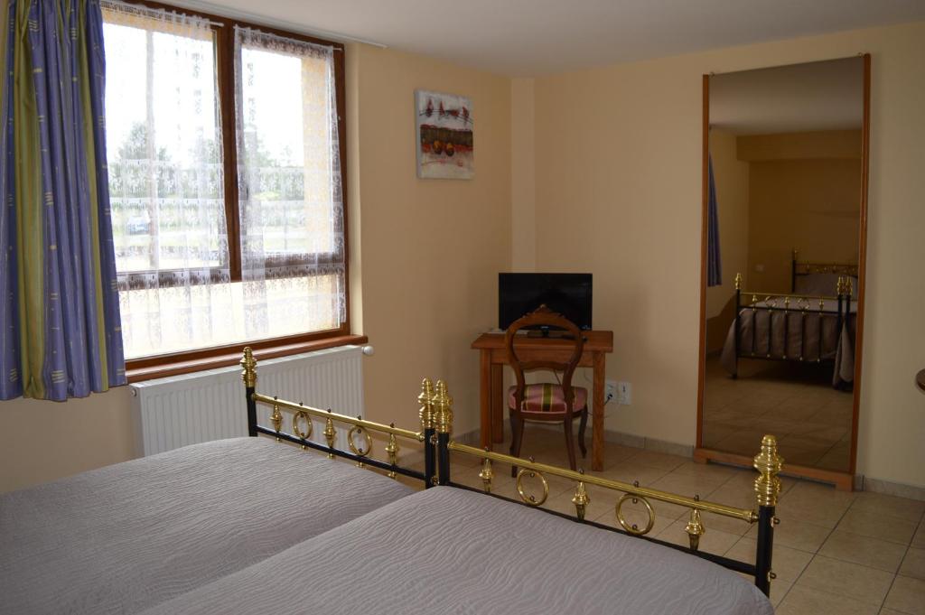 Postel nebo postele na pokoji v ubytování Côté Midi Chambre d'hôte