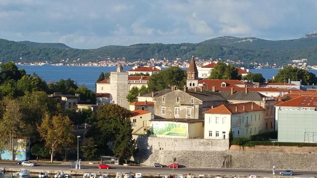 a cityscape of a town with a body of water at Panorama Apartment in Zadar