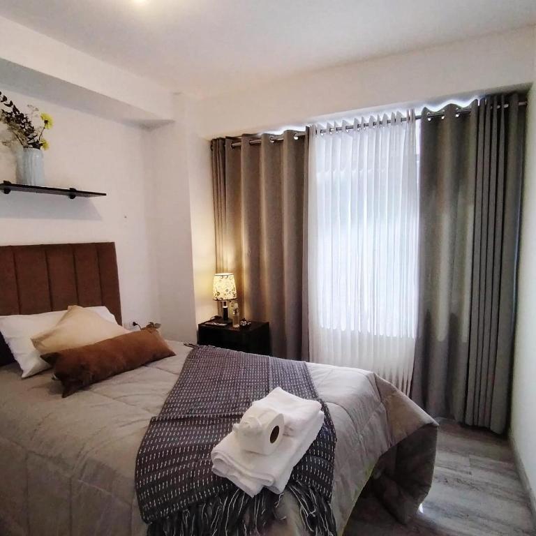 En eller flere senge i et værelse på Torre Vallecito