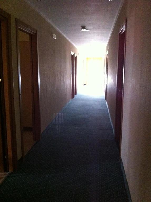 Postel nebo postele na pokoji v ubytování Hotel Atleti