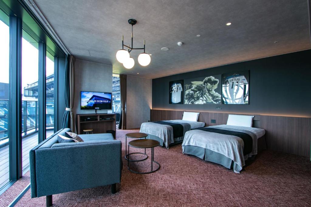 Postel nebo postele na pokoji v ubytování tower eleven hotel