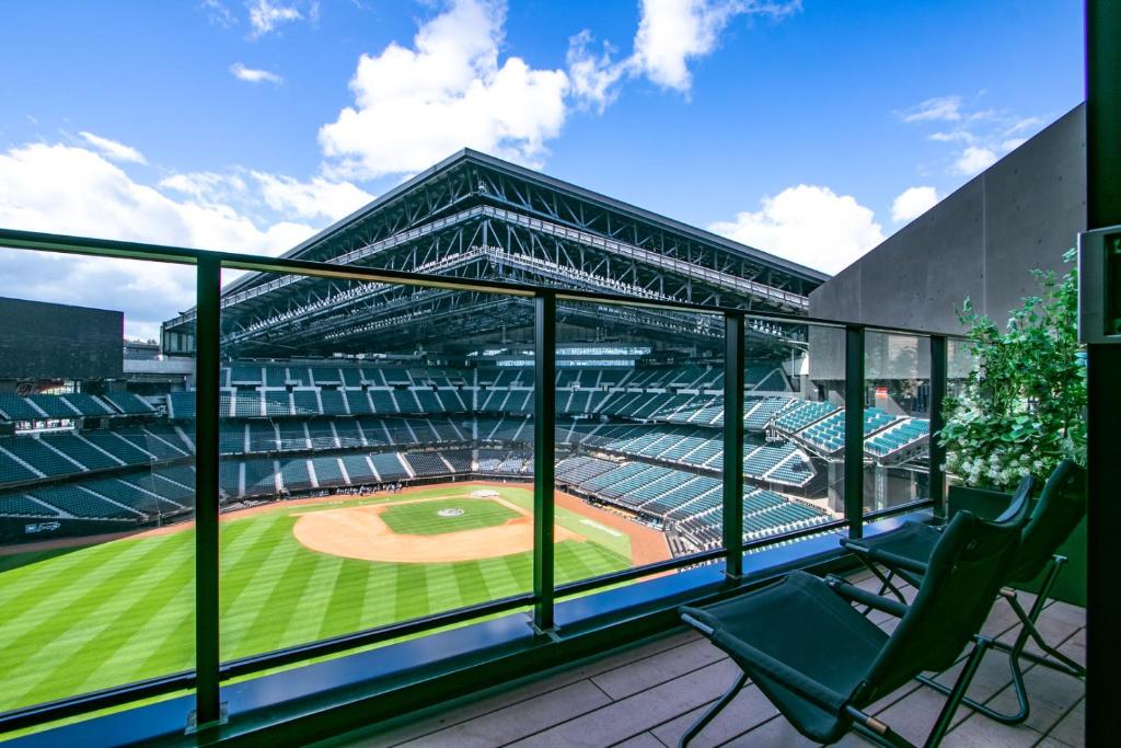 a view from the balcony of a baseball game at tower eleven hotel in Kitahiroshima