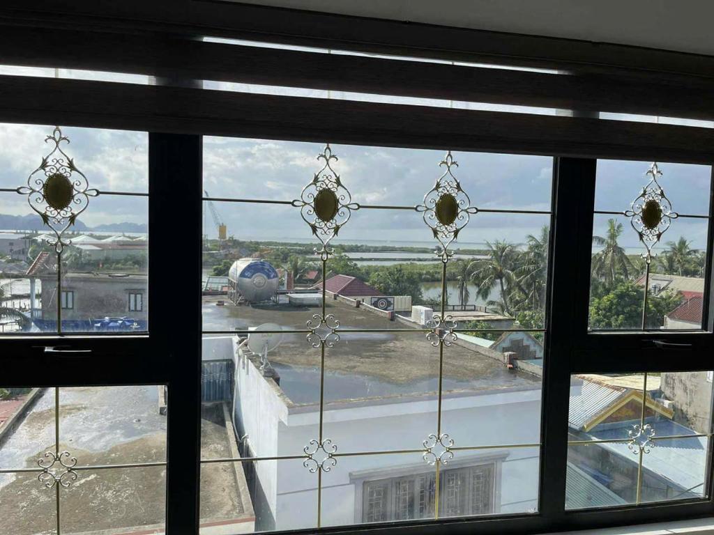 a view of an airport from a window at Phu Long Mermaids Hostel 1 in Phù Long