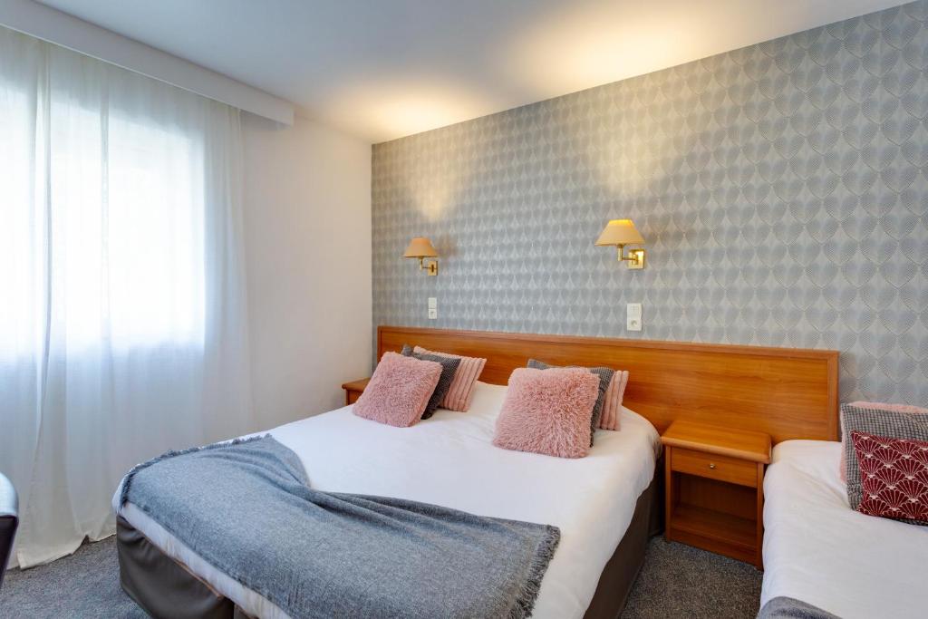 Brit Hotel le Cygne - Driepersoonskamer