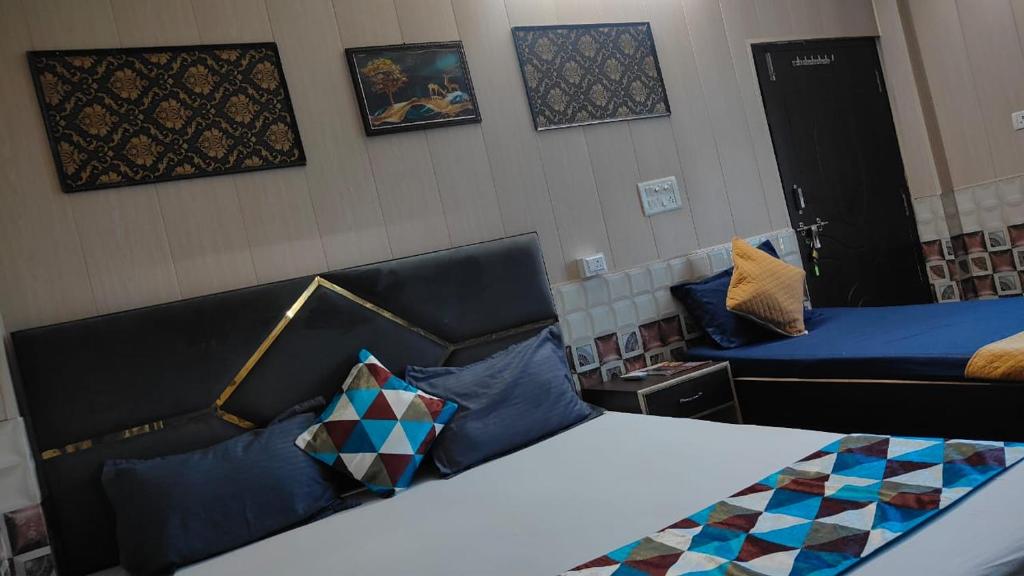Ένα ή περισσότερα κρεβάτια σε δωμάτιο στο IQ Hotels