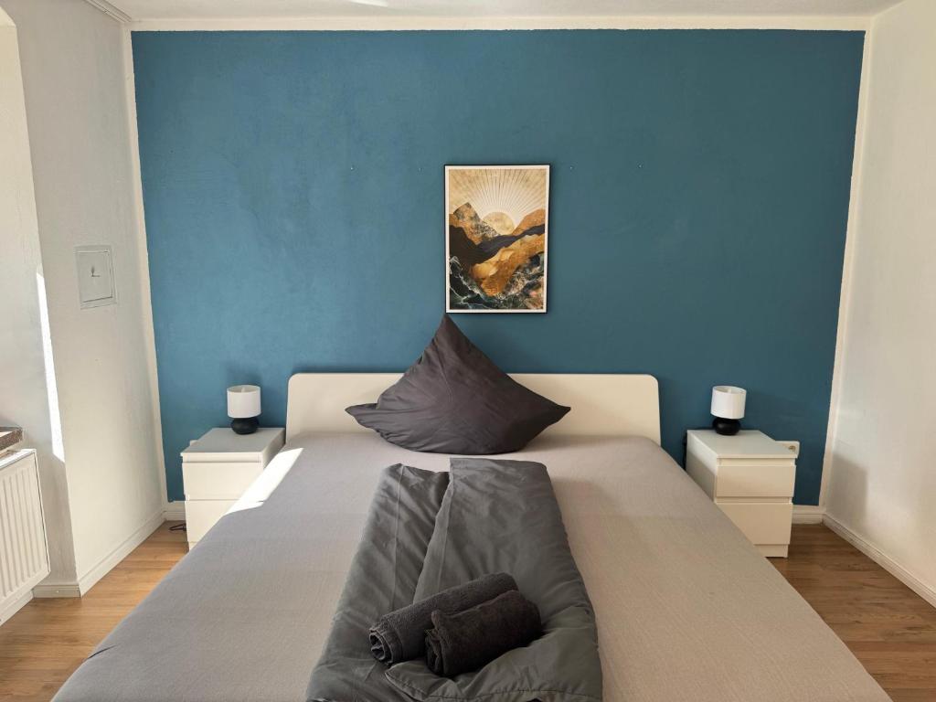 Ένα ή περισσότερα κρεβάτια σε δωμάτιο στο Ferienhaus "Jasmine" mit 3 Schlafzimmern und Stellplatz