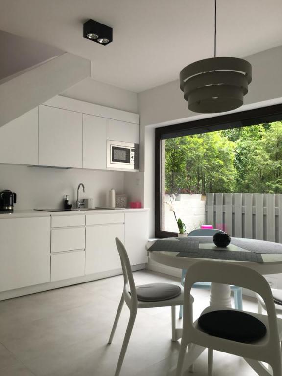 Kuchyň nebo kuchyňský kout v ubytování Costa Apartments