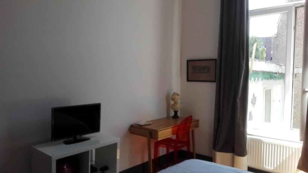 TV a/nebo společenská místnost v ubytování B&B Villa 36